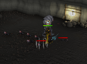 A player fighting the Baby Abyssal spiders.